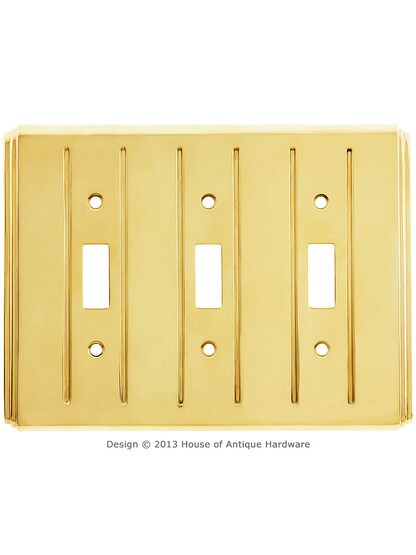 Streamline Toggle Switch Plate - Triple Gang in Unlacquered Brass.